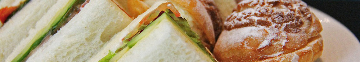 Eating Sandwich at The Carving Board West LA restaurant in Los Angeles, CA.